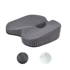 Premium gray orthopedic seat cushion with dotted mesh pattern and coccyx relief design for office chair comfort