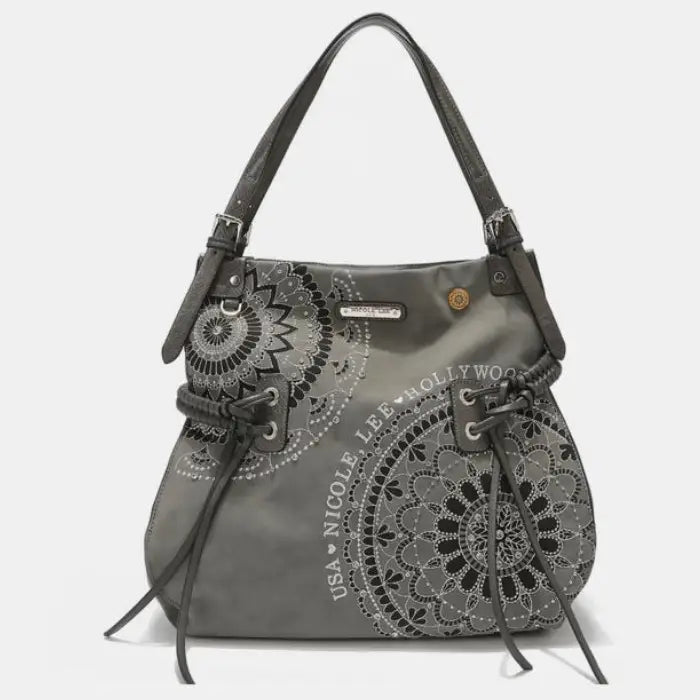 Gray shoulder bag featuring a detailed mandala design and braided accents, ideal for everyday use.