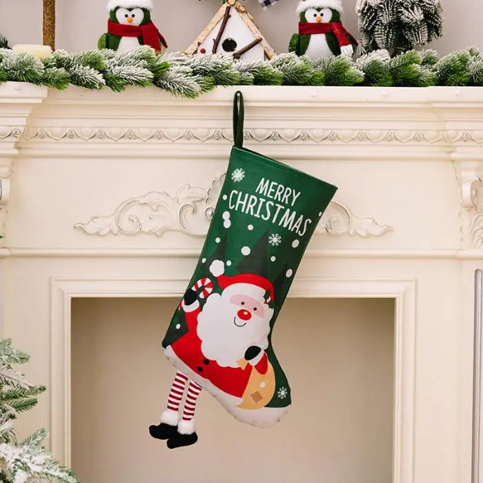 Green Christmas stocking featuring Santa with a candy cane, ideal for festive mantel decorations.