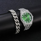 Elegant green dialed silver watch with intricate crystal design on black surface.