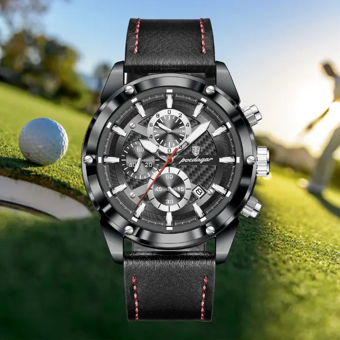 High-end leather watch with a gray strap, stainless steel case, and chronograph design, displayed on a golf course background.