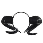 Halloween Devil Horns headband with glossy black curled horns and black band on white background.
