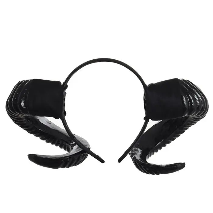 Halloween Devil Horns headband with glossy black curled horns and black band on white background.