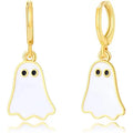 Glossy white ghost Halloween earrings with gold trim and black eyes on reflective surface.