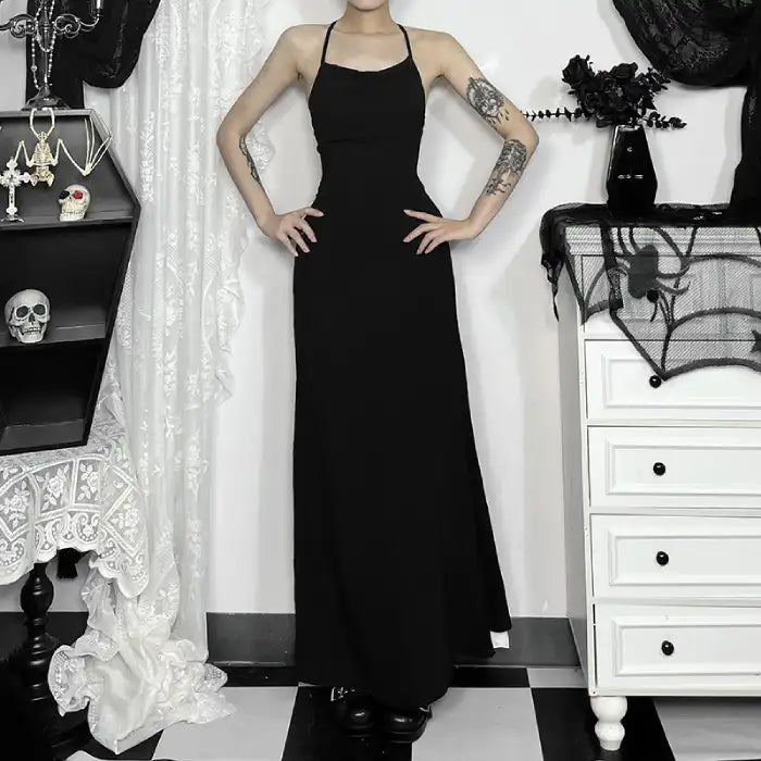 Halloween Elvira outfit black sleeveless maxi dress with spaghetti straps and fitted silhouette