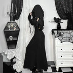 Halloween Elvira outfit side view of black hooded dress with ruched sleeves and witchy dark aesthetic