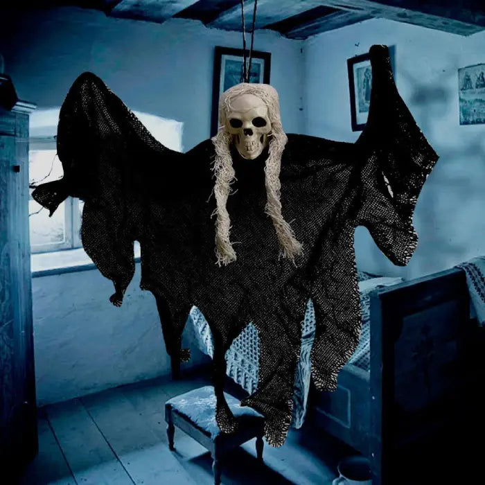 Halloween Ghost Skull floating spirit in black gauze with white hair in spooky room.