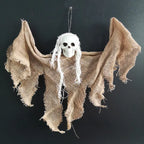 Halloween Ghost Skull hanging ghost with distressed brown fabric wings and white hair.