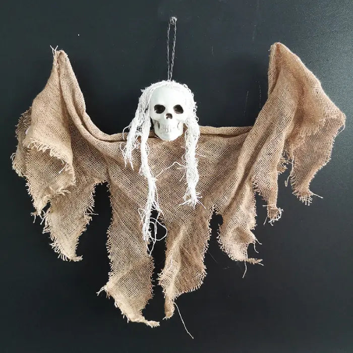 Halloween Ghost Skull hanging ghost with distressed brown fabric wings and white hair.