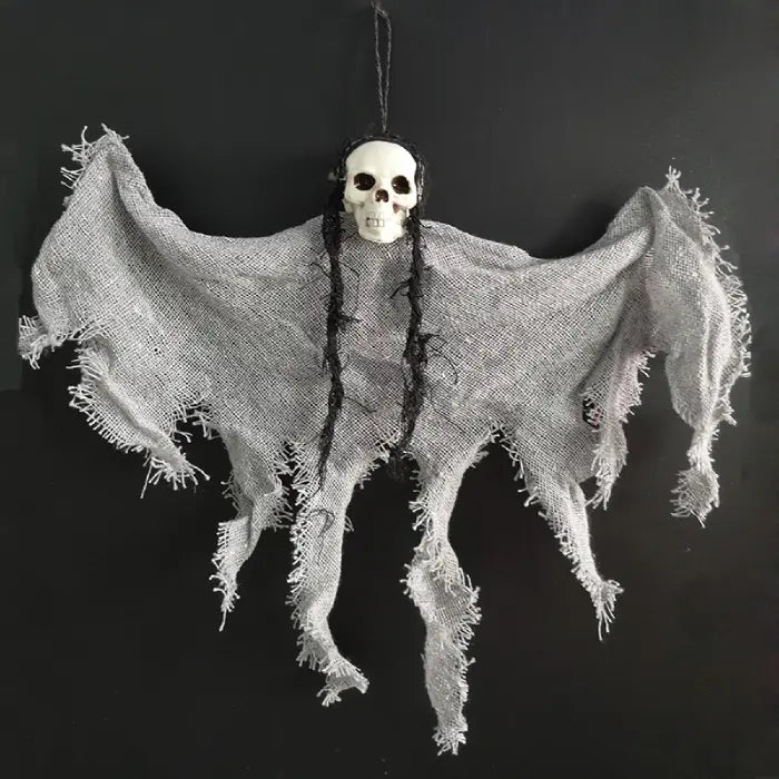 Halloween Ghost Skull hanging ghost with tattered grey fabric and black braided hair strands.