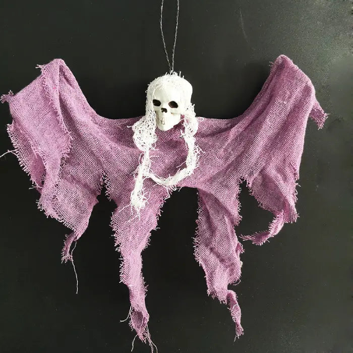 Halloween Ghost Skull hanging decoration with tattered purple cloth and spooky face.