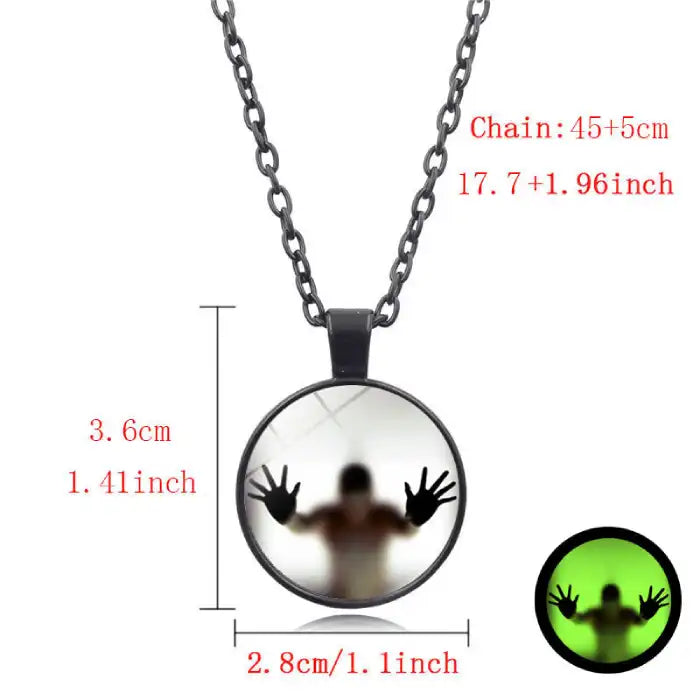 Halloween Glow necklace with size measurements and creepy glow figure silhouette in black pendant.