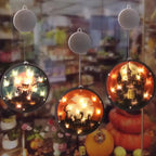 Halloween Lanterns glowing in cozy store display with festive pumpkins and spooky-themed shelves.