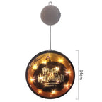 Halloween Lanterns with black pumpkin silhouette, spider web, and glowing Happy Halloween