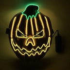 Halloween LED jack-o-lantern mask with menacing expression featuring yellow and green glowing lights, perfect for Halloween night celebrations.