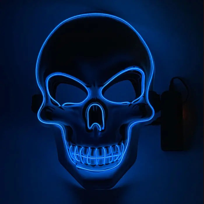 Halloween LED skull mask with blue glowing outline against dark background, creating a haunting effect for nighttime Halloween events.