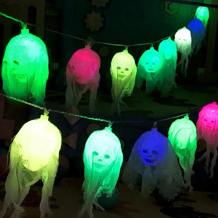 Halloween lights skull ghost set with multicolor LED sample and festive background.