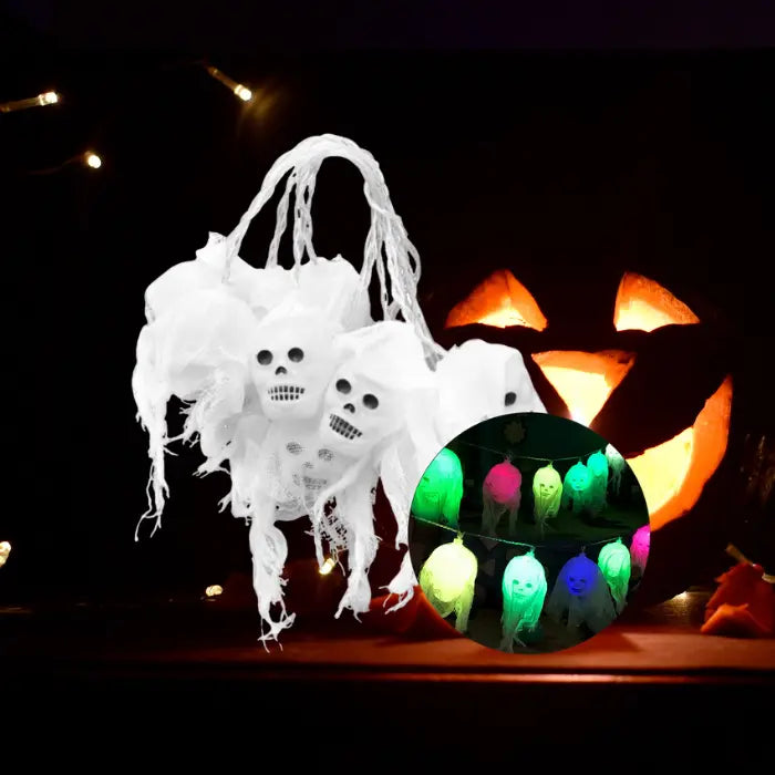 Halloween lights featuring multicolor glowing skulls on hanging string for spooky decor.