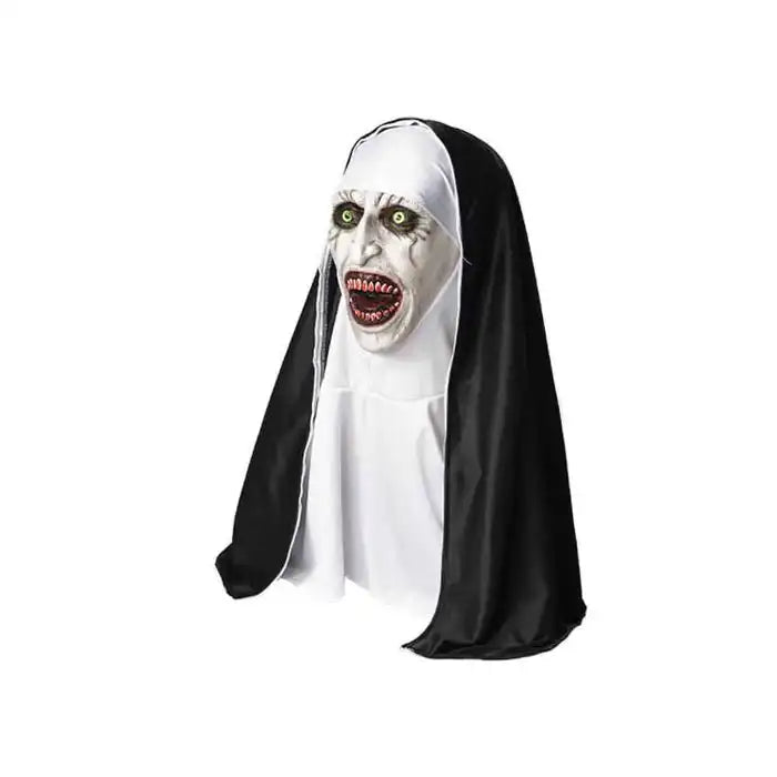 Halloween mask side view showing terrifying nun with green eyes, sharp teeth, and sinister expression.