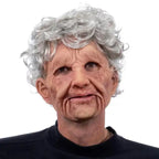 Halloween Mask depicting an old woman with curly silver hair and deep wrinkles on realistic silicone face
