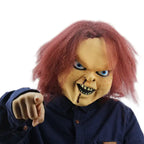 Halloween mask styled as scary doll with red frizzy hair, blue eyes, and blood under the nose.