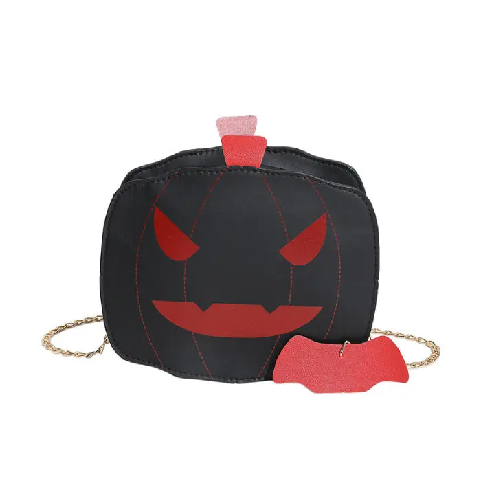 Black Halloween Pumpkin Head bag with red eyes and bat charm shown from front