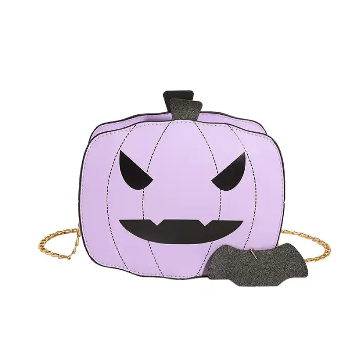 Purple Halloween Pumpkin Head bag with black stitched face and bat charm on white background