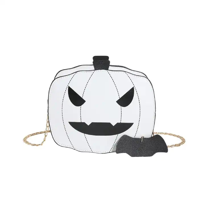 White Halloween Pumpkin Head bag with black eyes and mouth with gold chain and bat charm