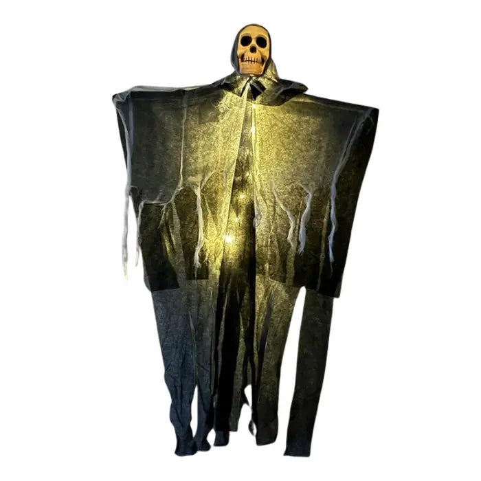 Halloween skeleton ghost prop with glowing yellow lights and hooded fabric for eerie decorative lighting.