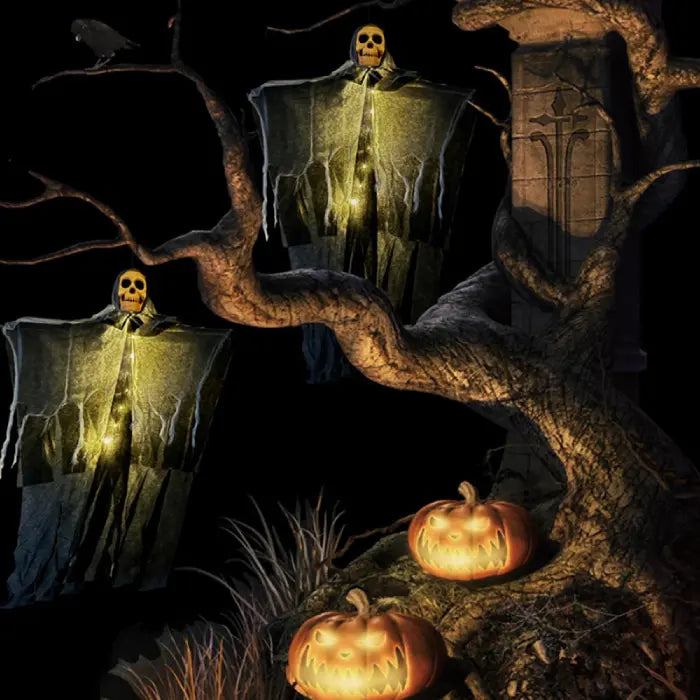 Halloween skeleton ghosts glowing in graveyard tree scene with pumpkins and tombstone at night.
