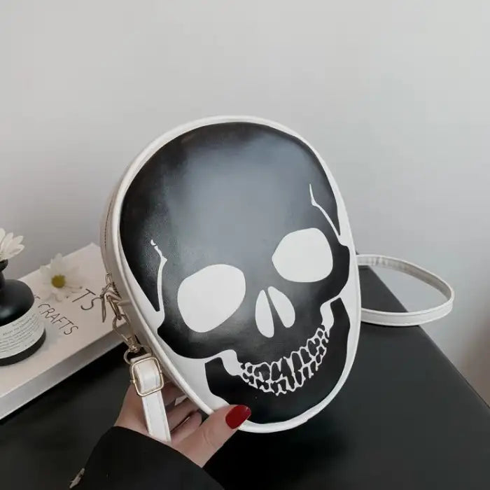 Halloween Skull Bag in white with bold black skull graphic, crossbody strap and edgy design.