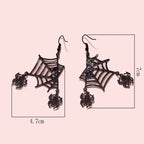 Halloween spider web earrings with red spiders shown with measurements of 7cm by 4.7cm