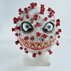 Halloween virus costume mask with evil grin, blue eyes, sharp teeth, and red spikes on gray base.