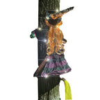 Halloween Witch Outdoor Courtyard Pendant clinging to tree with glowing LED lights and pointed hat.