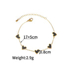 heart-charm-bracelet in gold with black hearts shown with size measurements for accurate fit, offering a sleek modern bracelet option