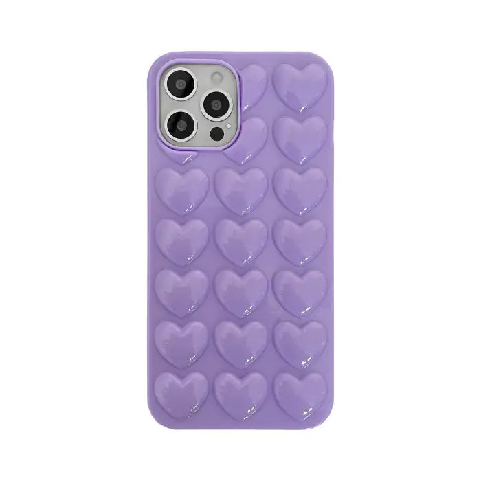 Heart iPhone case featuring 3D raised bubble hearts in purple glossy silicone with precise camera cutout for protection and style