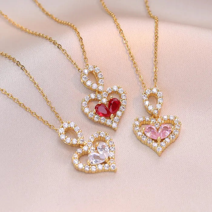 heart pendant necklace set of gold double heart pendants with red pink and clear gems