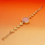 Heart stone watch shown from the back with gold bracelet links offering a detailed view of elegant craftsmanship and stylish wristwear design