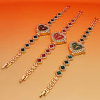 Heart stone watch trio displayed at an angle showing black, red, and green gemstone bracelet designs with sparkling crystal heart dials for women