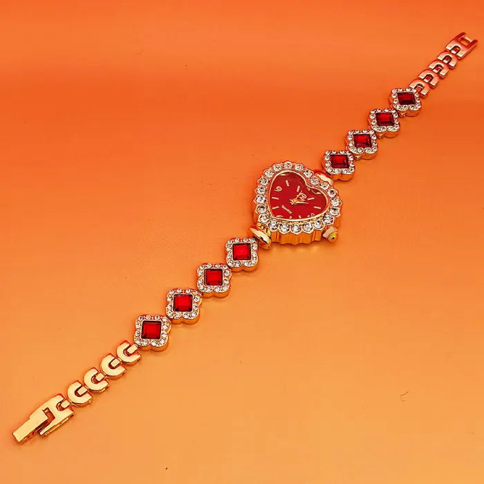 Heart stone watch with red dial framed in crystals featuring matching red gemstone bracelet links offering a bold elegant fashion accessory