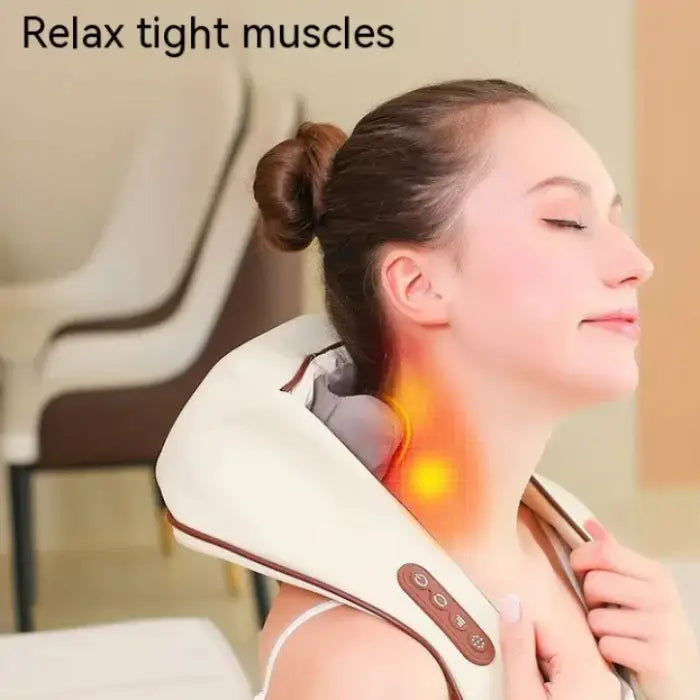 Person using white neck massager with heat therapy function, orange glow indicating warming feature for muscle relaxation