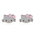 Hello kitty stud earrings from jewelry set featuring pink bows and crystal-studded design.