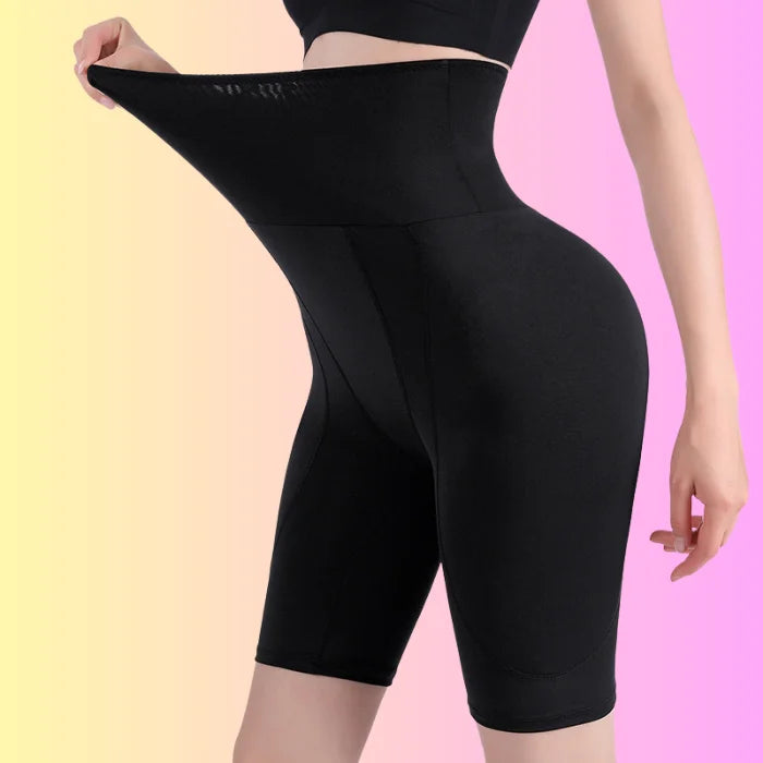 Model stretching black high waist shaping shorts showing strong elasticity and comfortable fit.