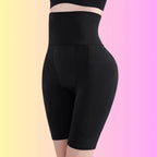 Black high waist shaping shorts with smooth compression fit for slimming and curve enhancement.