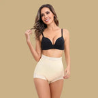 high waisted butt lifting shapewear in beige worn by smiling model, offering smoothing compression and natural curve enhancement
