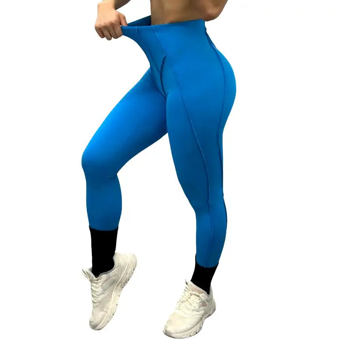 High-waisted leggings in blue with stretch fit, front view, ideal for workouts and daily movement.