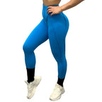 High-waisted leggings in blue with side view fit, sculpting seams and athletic support.