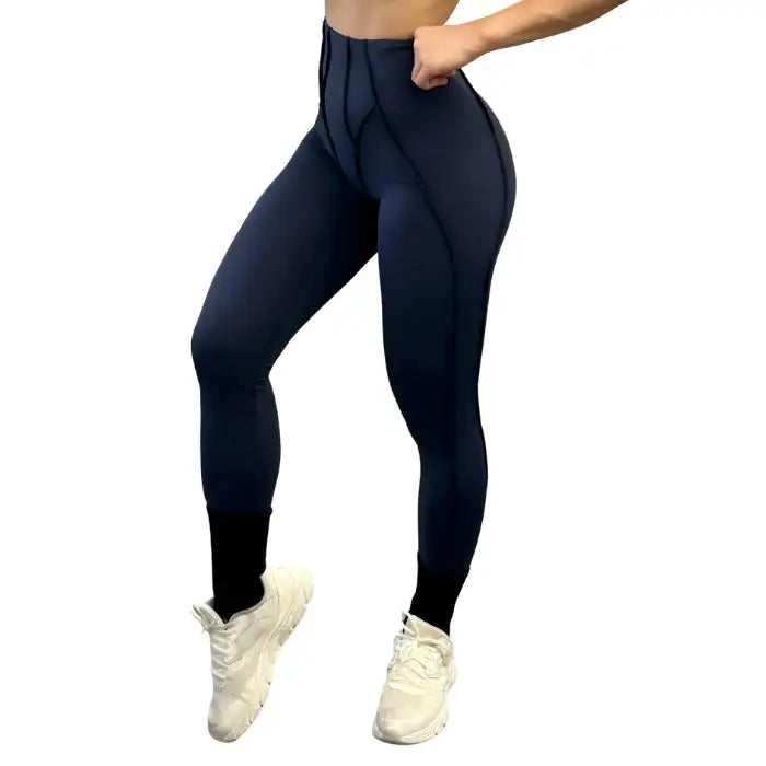 High-waisted leggings in navy with compressive fit, front view ideal for active lifestyle wear.