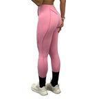 High-waisted leggings in pink shown from the back, designed for comfort and body contouring.