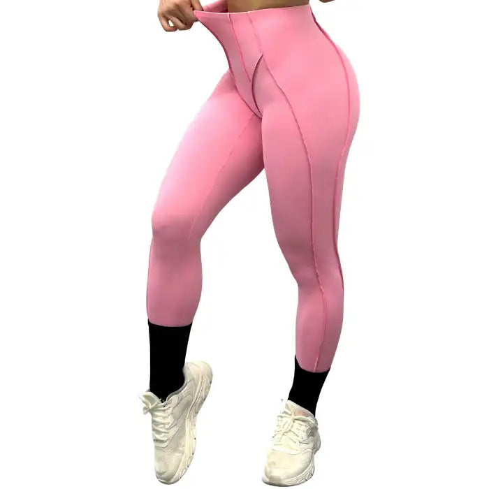 High-waisted leggings in pink with front view design, perfect for gym or everyday activewear comfort.